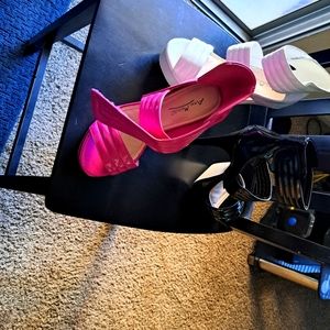 High heels. 1 Pink 1 black 1 white pair